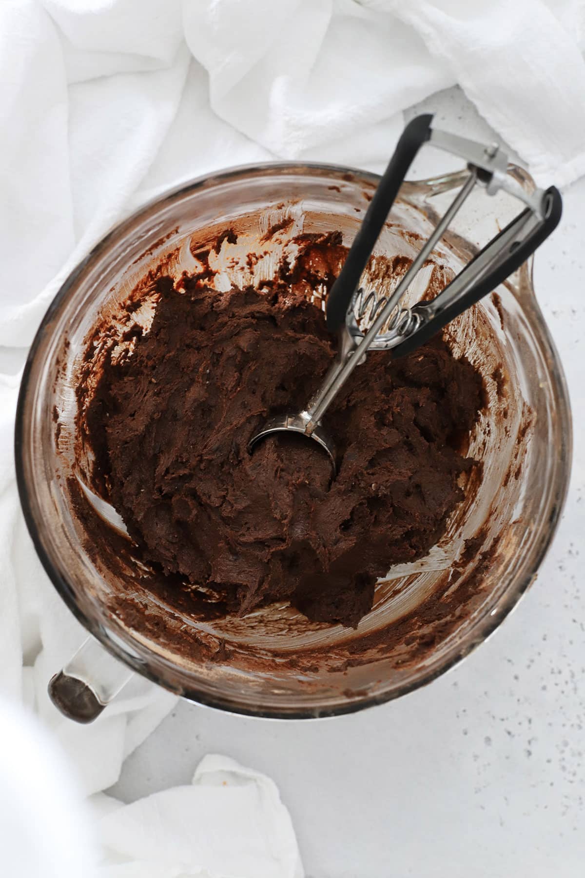 gluten-free chocolate chocolate chip cookie dough in a mixing bowl