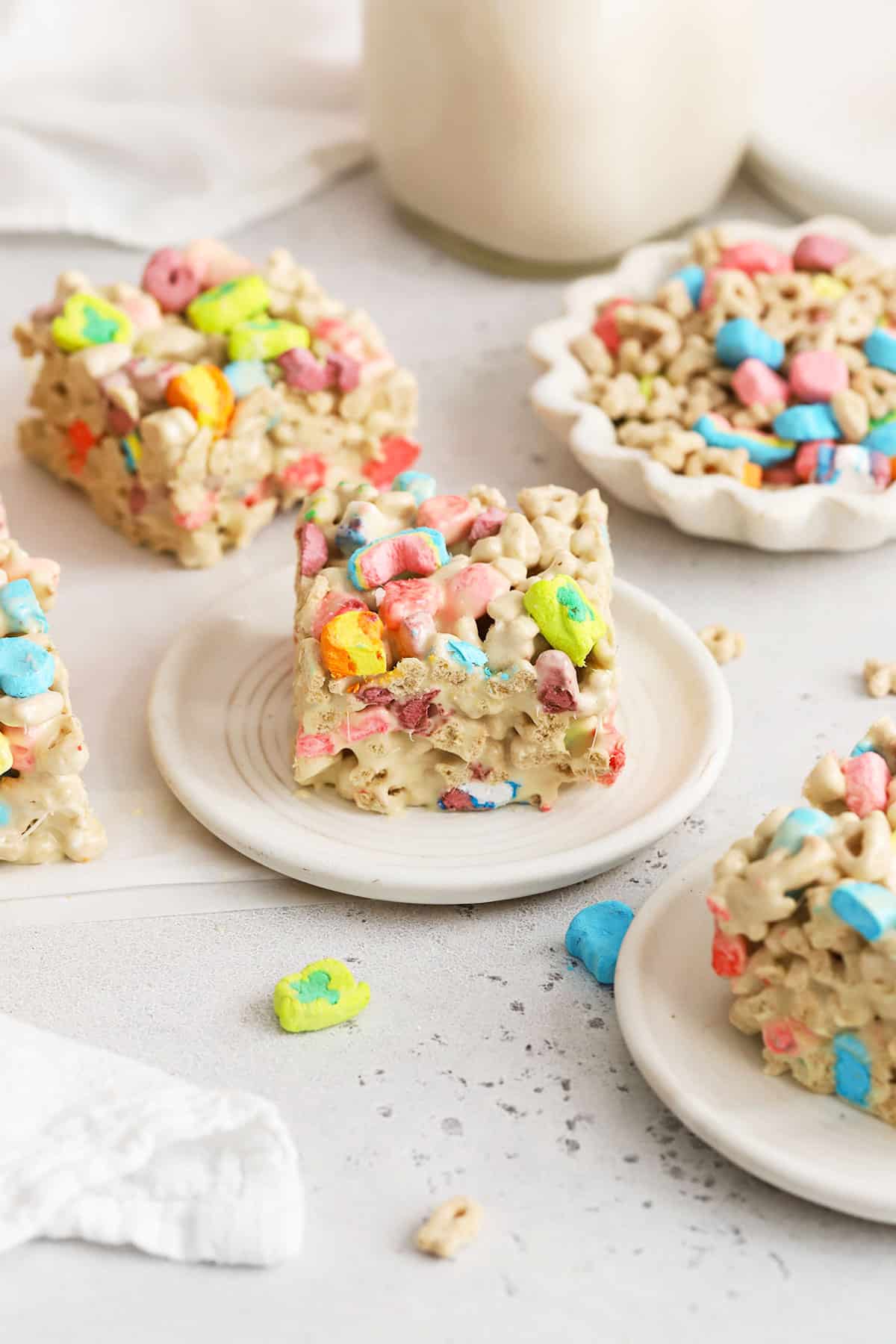 Lucky Charms treats on white plates