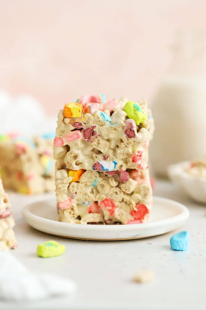 Lucky charms treats stacked on a white plate