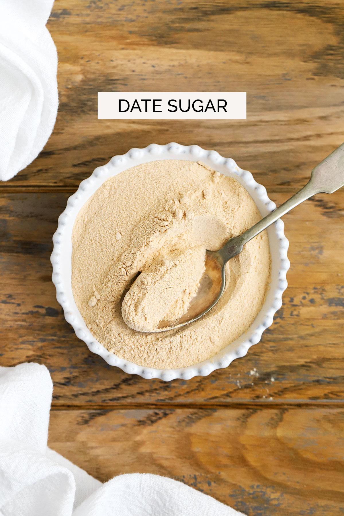 date sugar in a white bowl