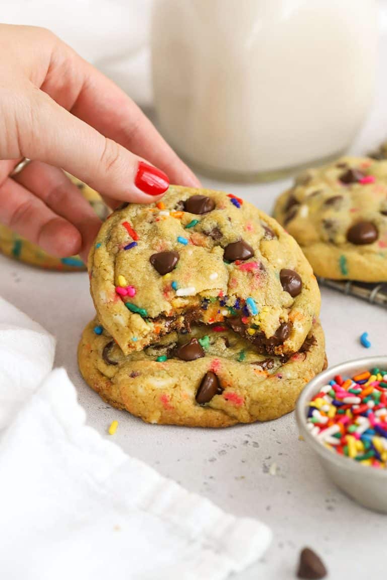 Setting down a gluten-free sprinkle chocolate chip cookie