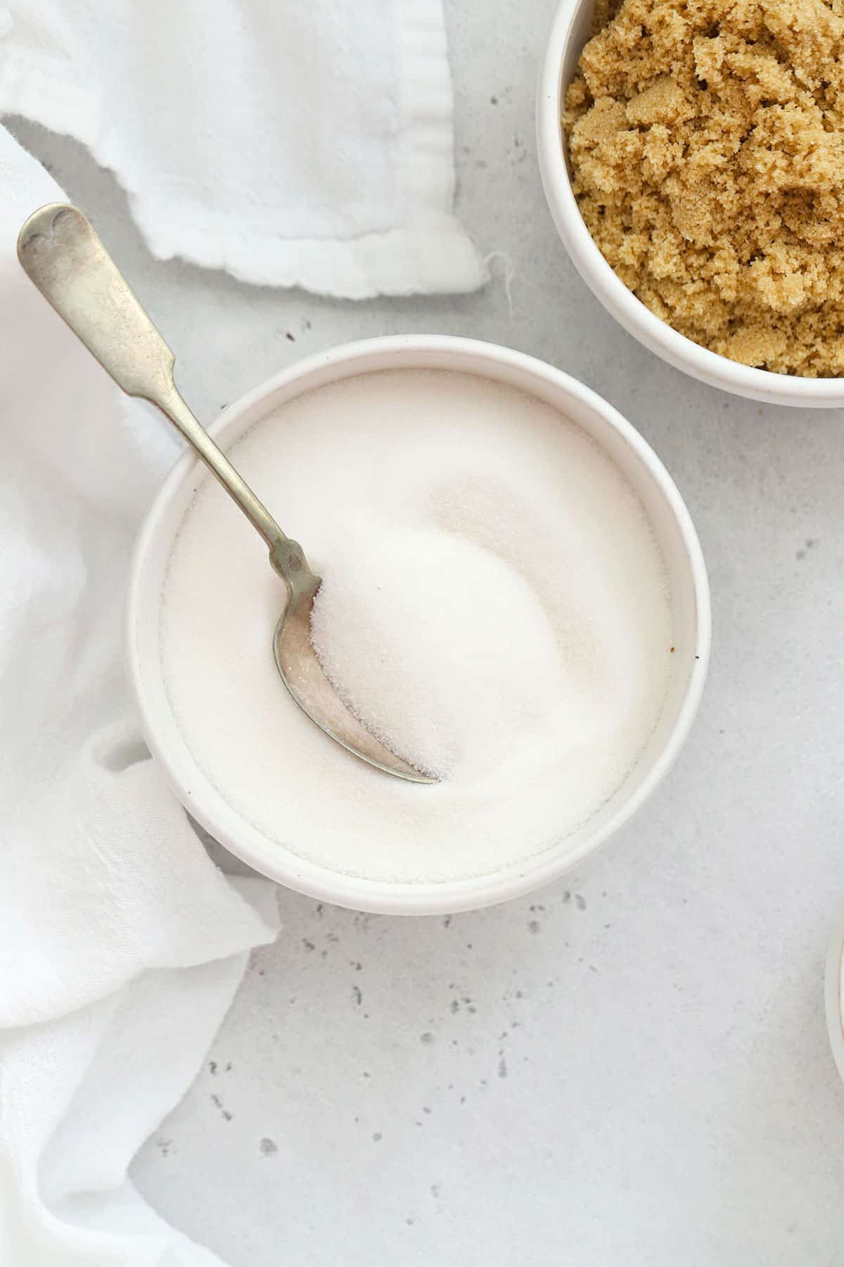 white sugar in a white bowl
