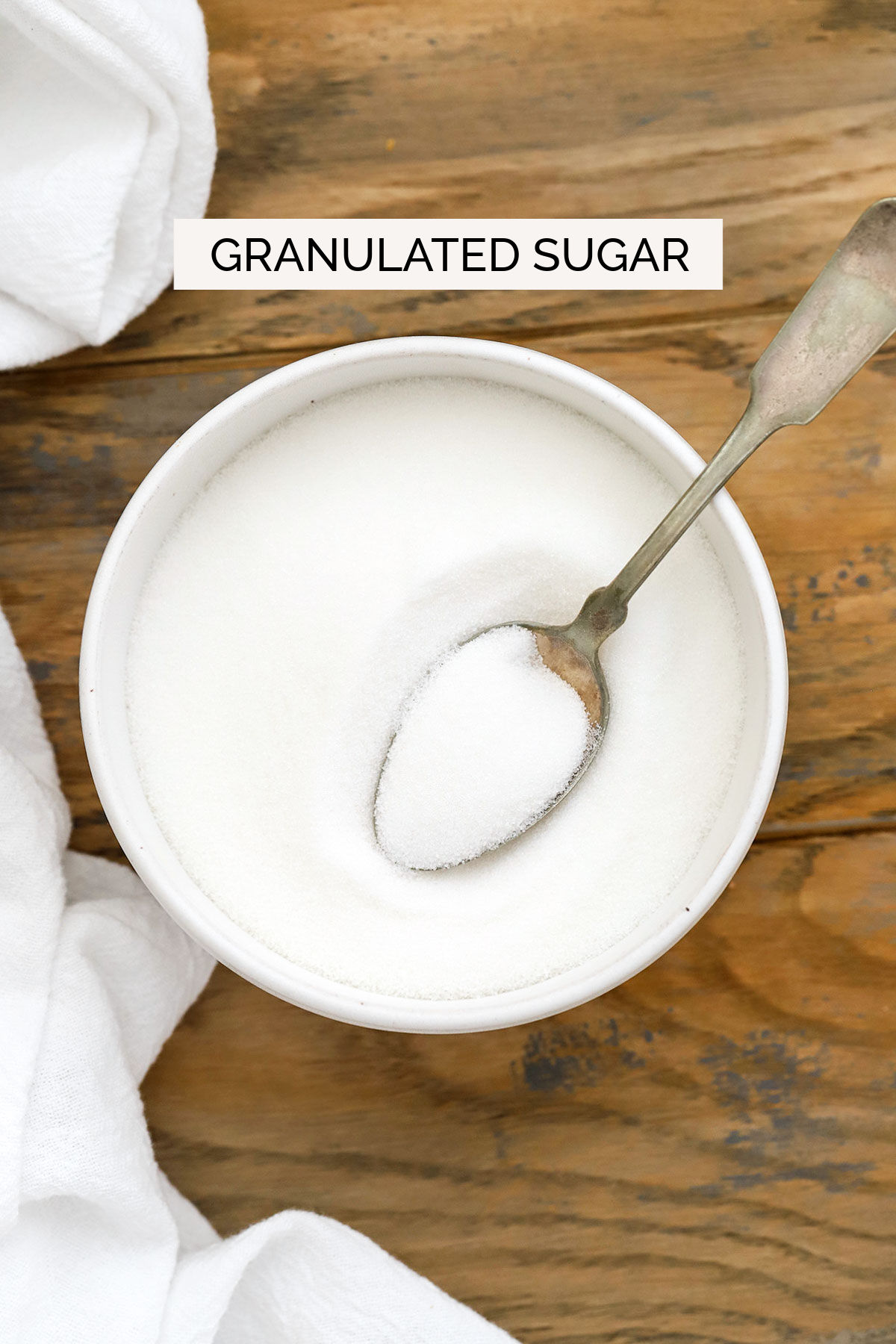 granulated sugar in a white bowl