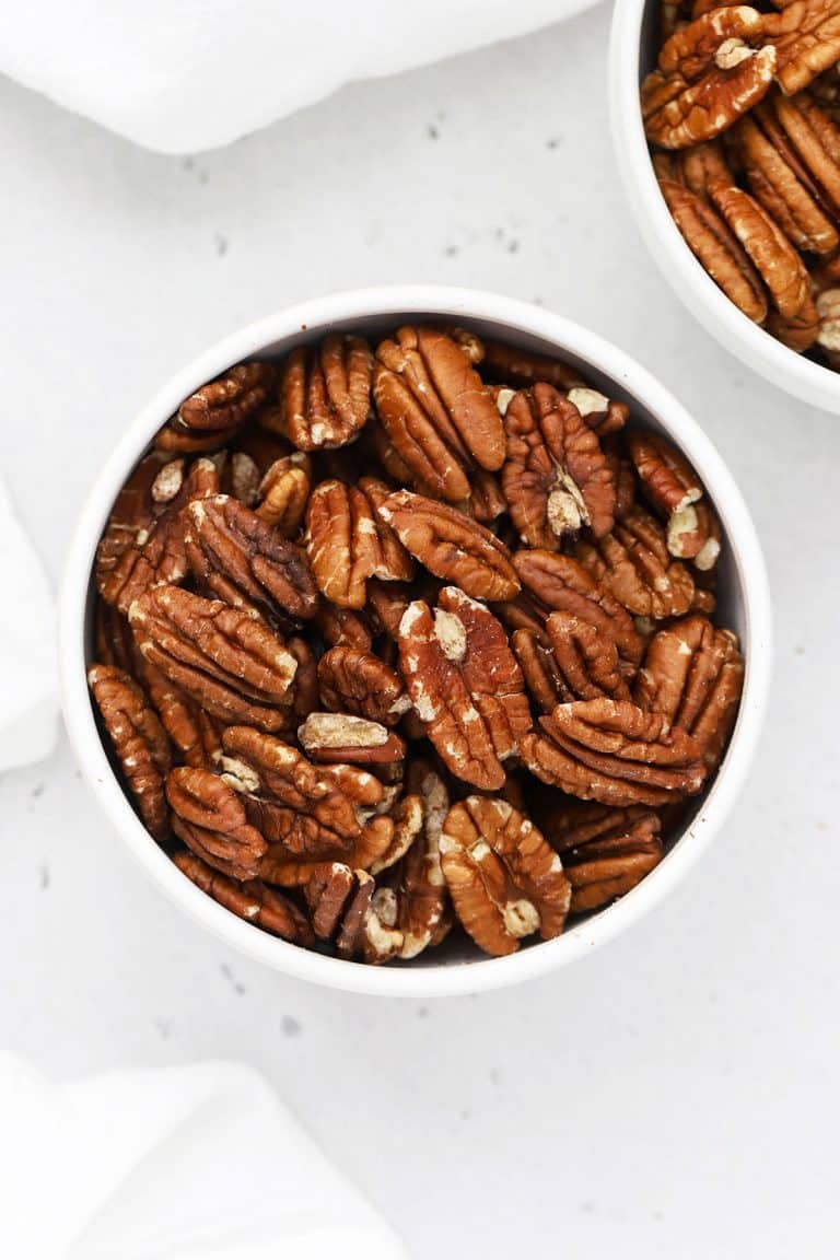 Two bowls of toasted pecans