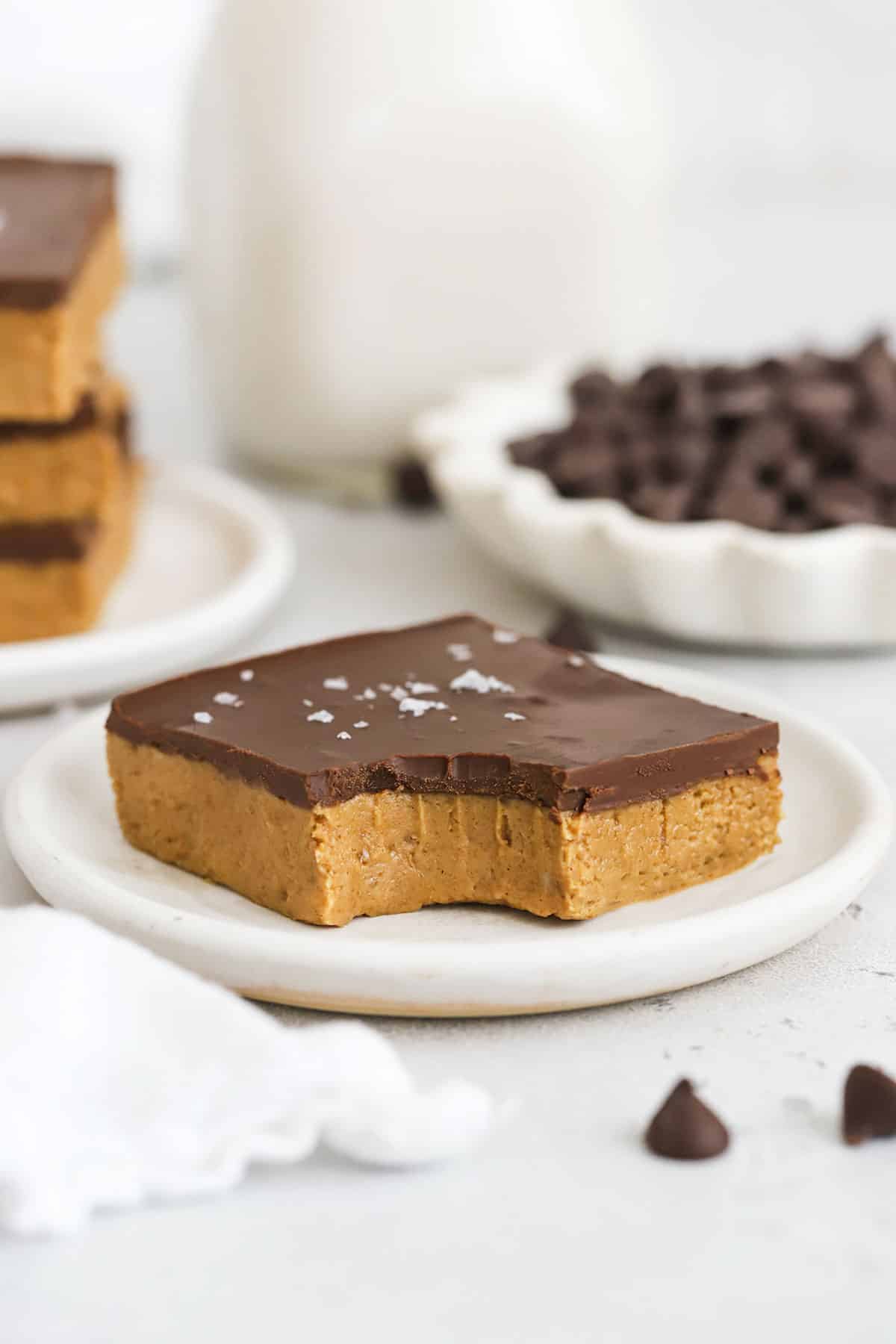 gluten-free chocolate peanut butter bar with a bite taken out of it
