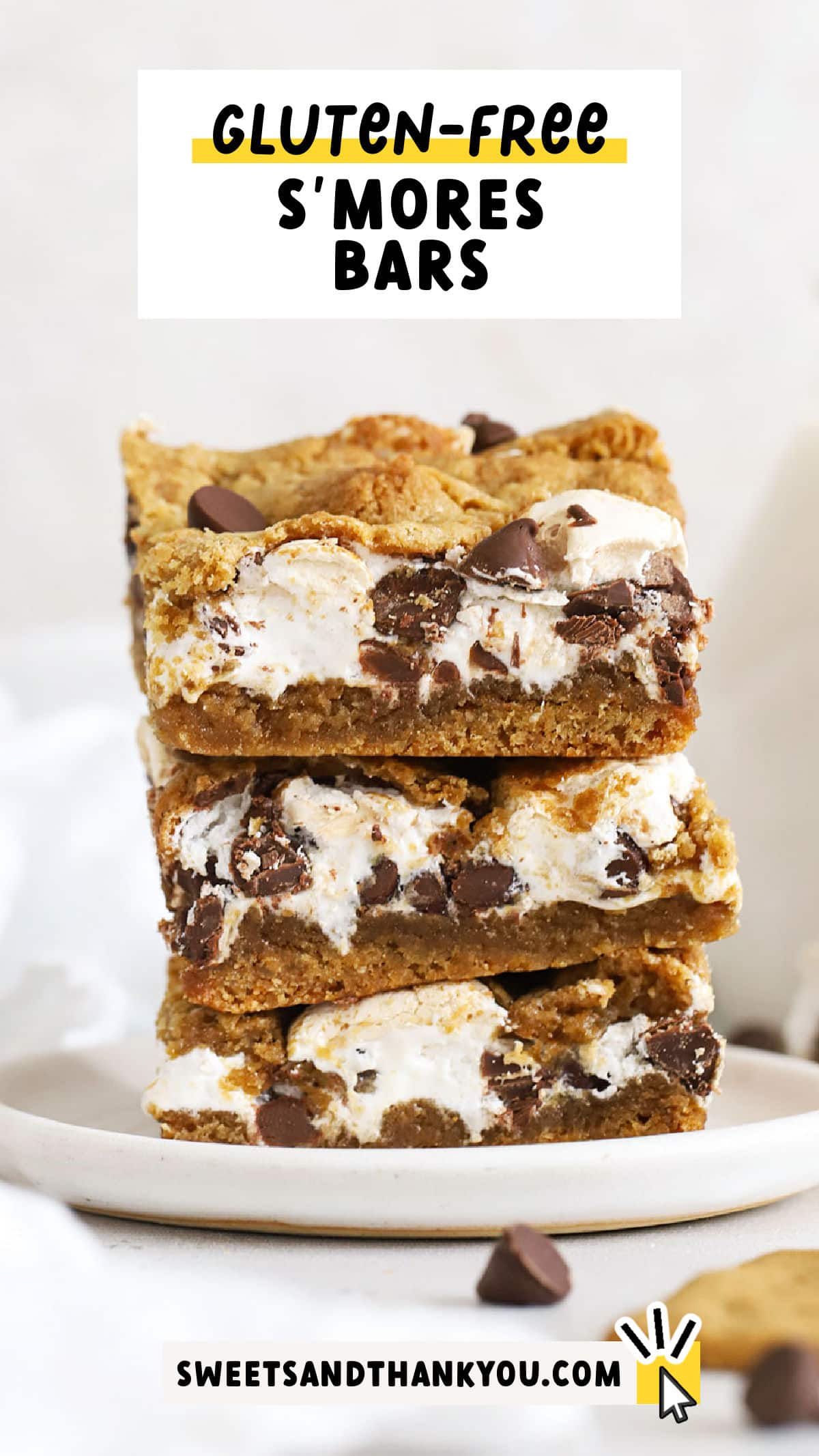 Soft, chewy gluten-free s'mores bars made with gooey marshmallow and melty chocolate between two layers of graham cookie. Yum! These gluten-free s'mores cookie bars are a fun summer dessert that channels the classic flavor of a s'more into a delicious cookie bar! Get the recipe at Sweets & Thank You