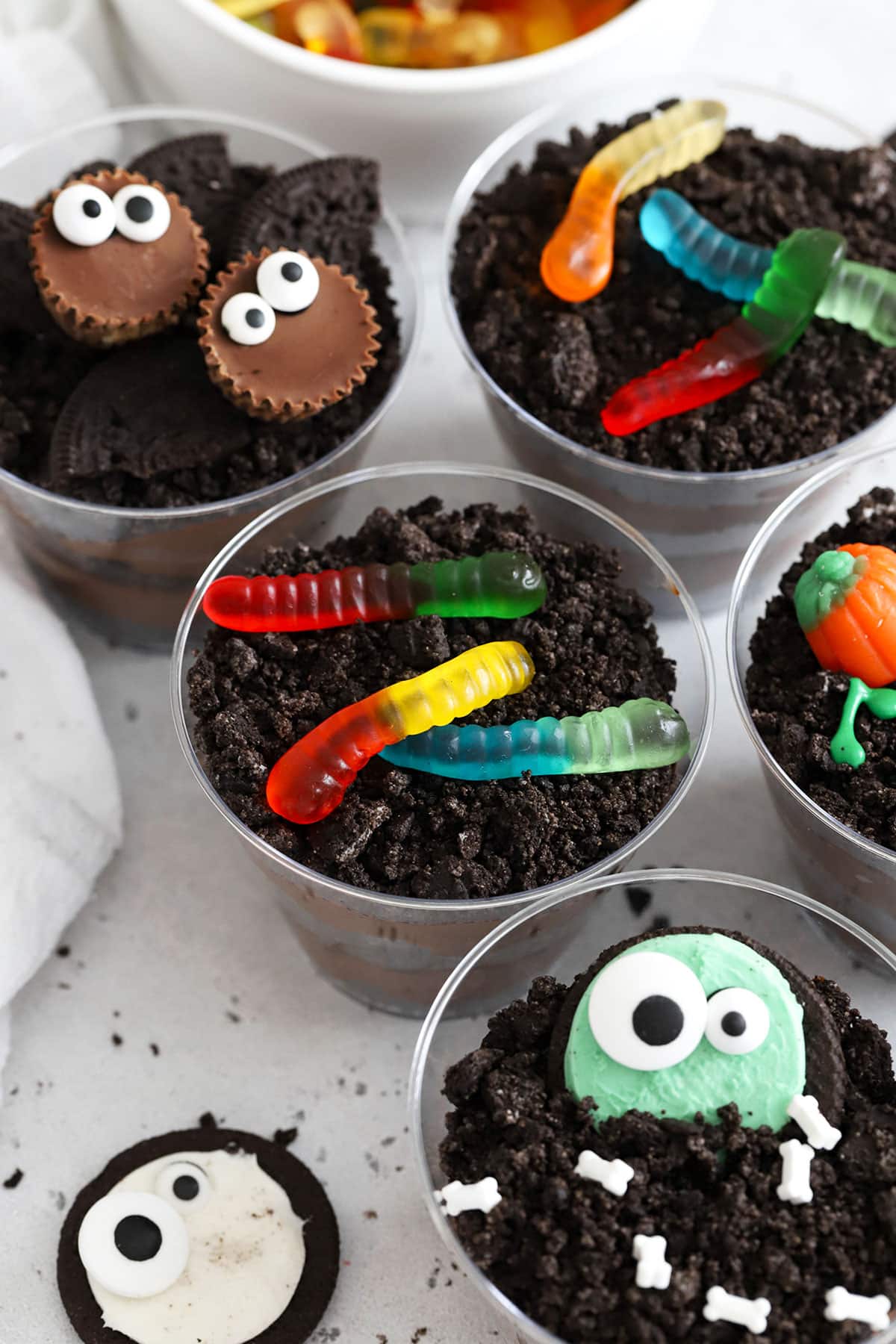 cups of gluten-free dirt pudding decorated for Halloween