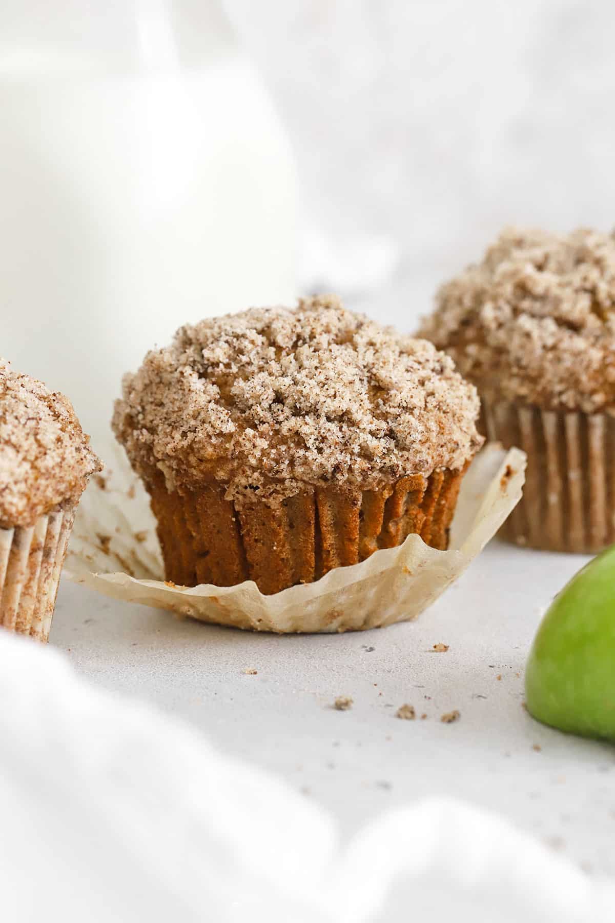 gluten-free applesauce muffins on a white background
