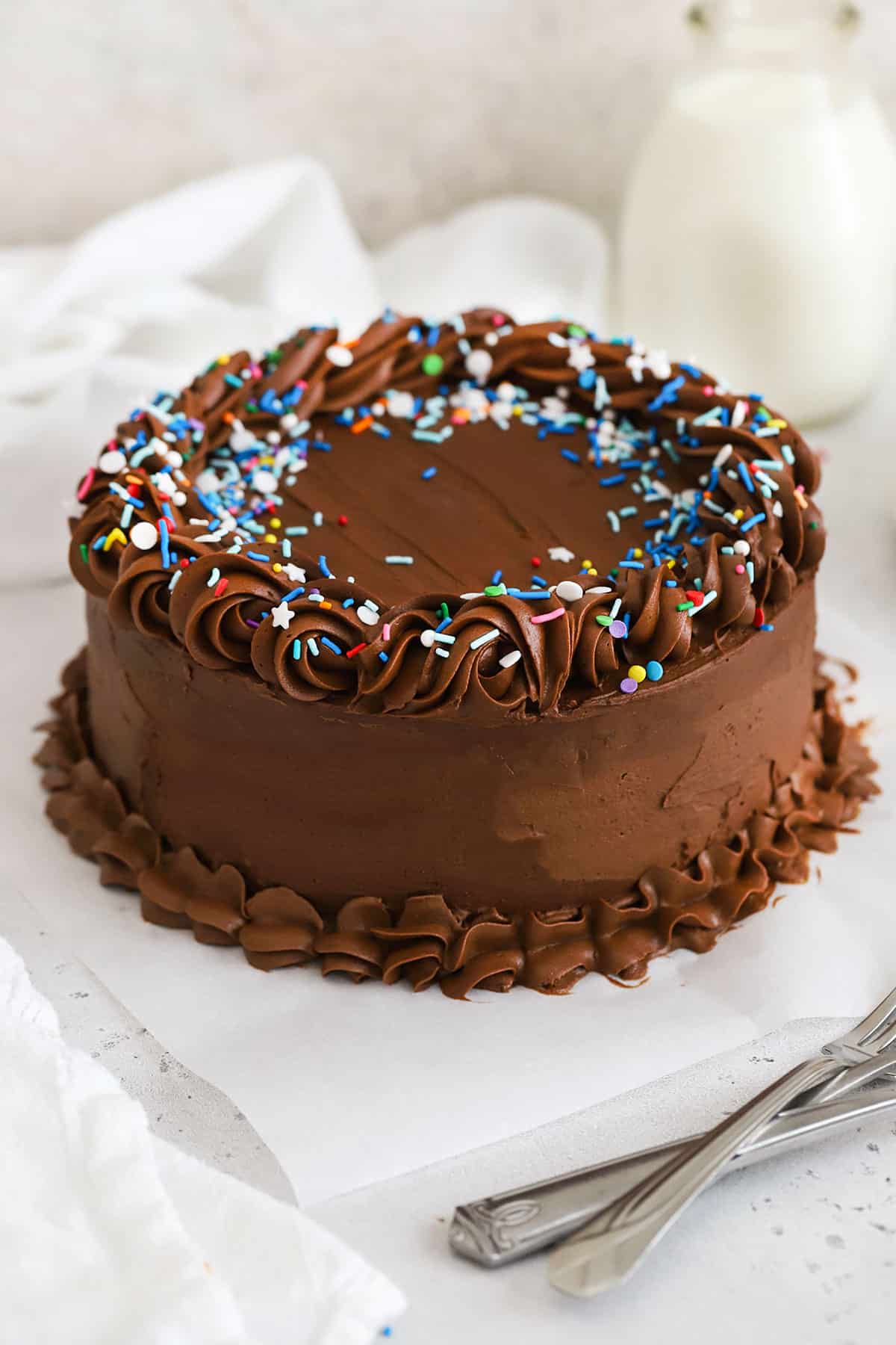 gluten-free birthday cake with chocolate frosting and sprinkles