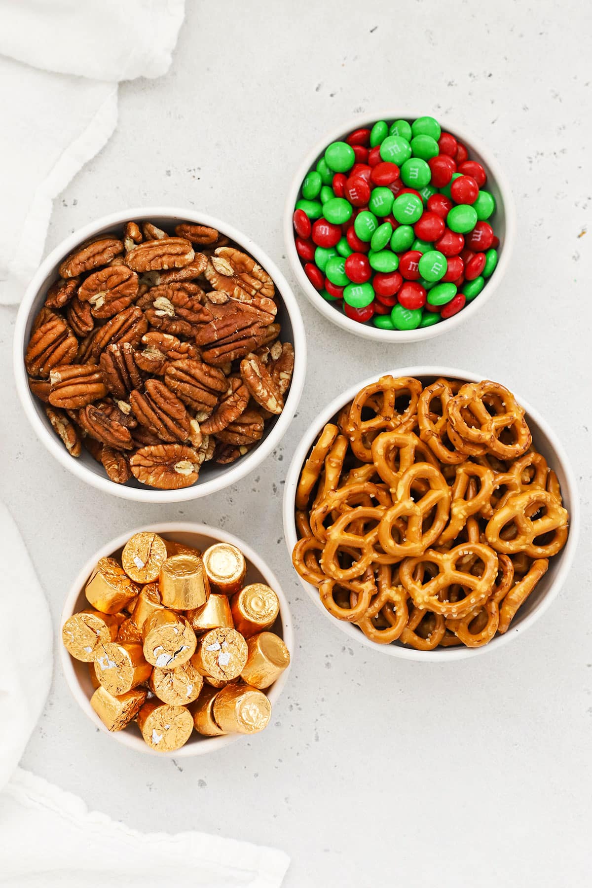 ingredients for gluten-free Rolo pretzels with m&ms or pecans