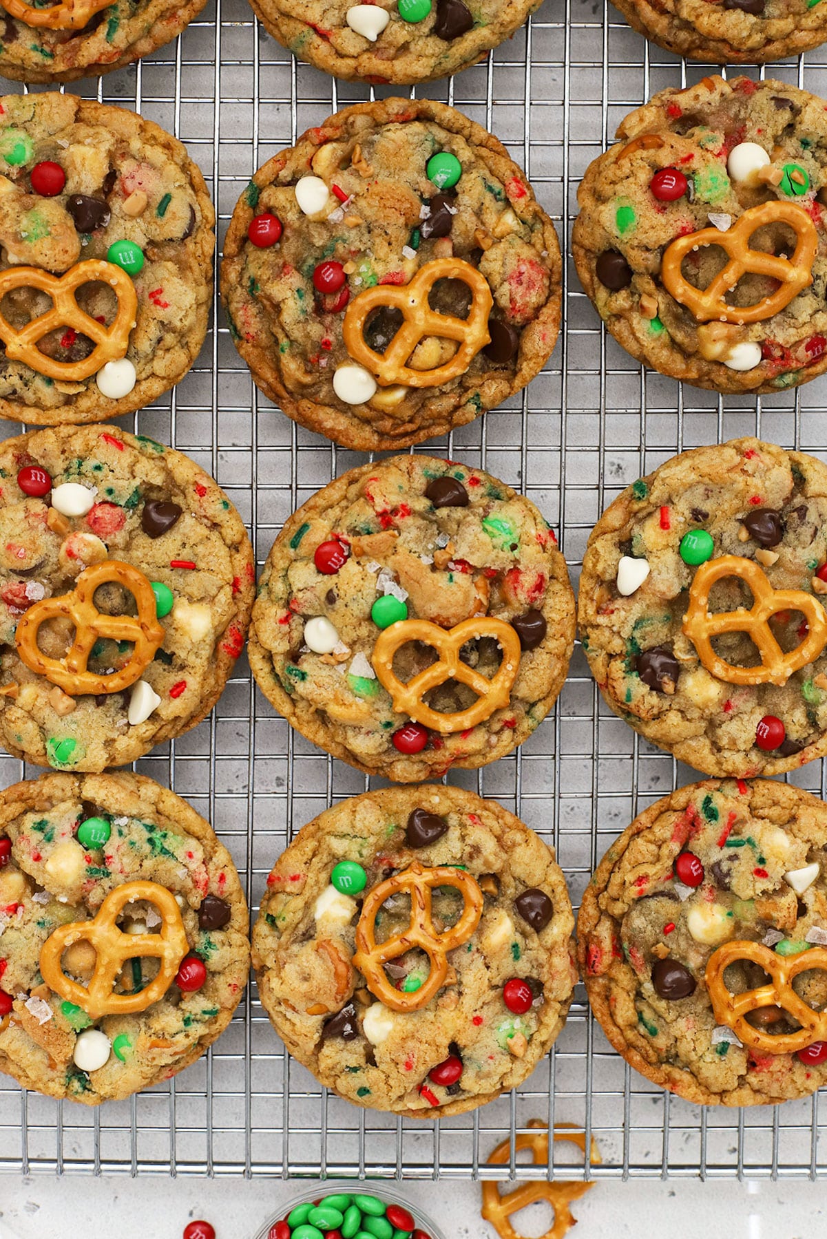 freshly baked gluten-free Christmas kitchen sink cookies on a cooling rack