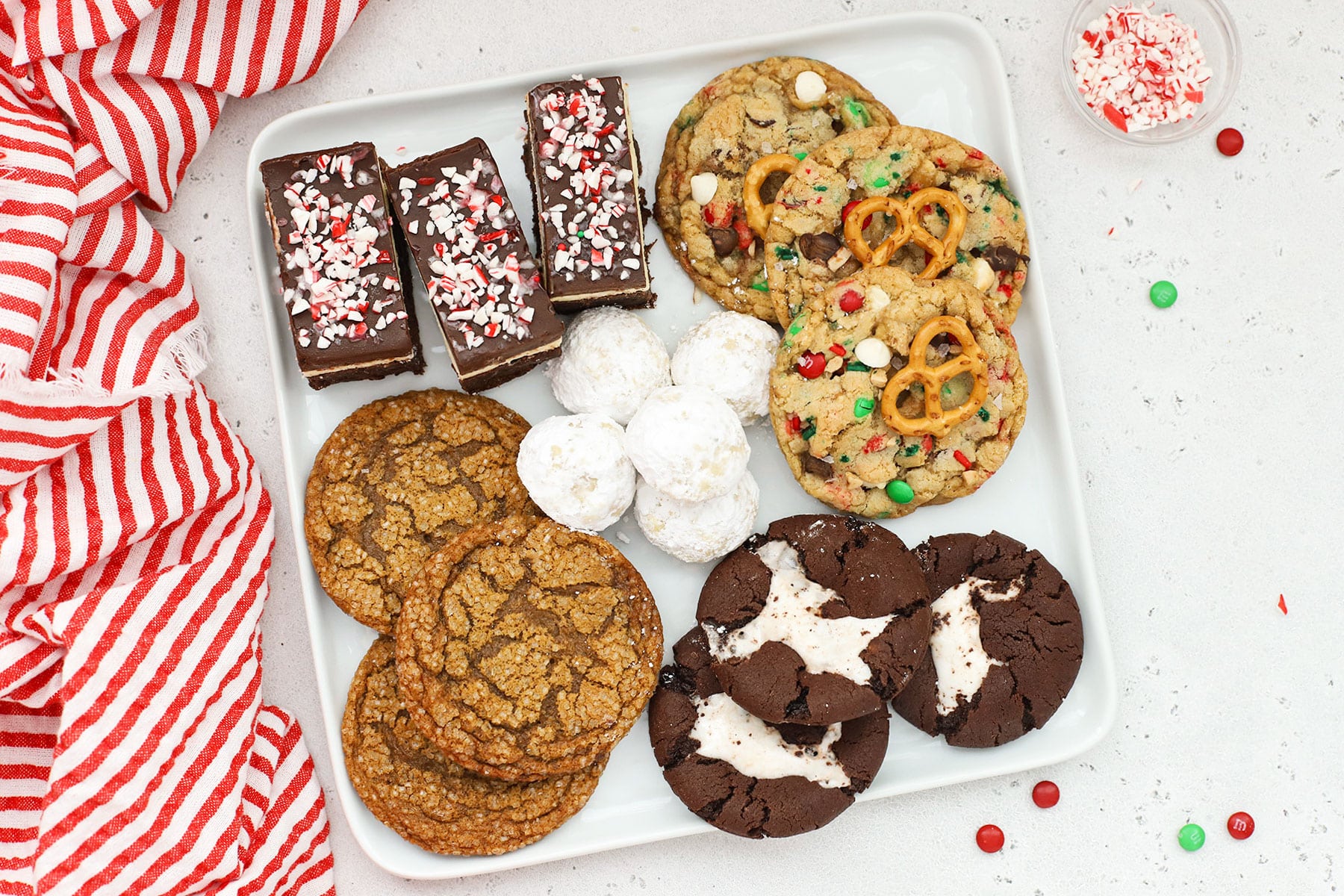 5 kinds of gluten-free holiday cookies on a white platter