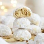 gluten-free snowball cookies stacked in a column