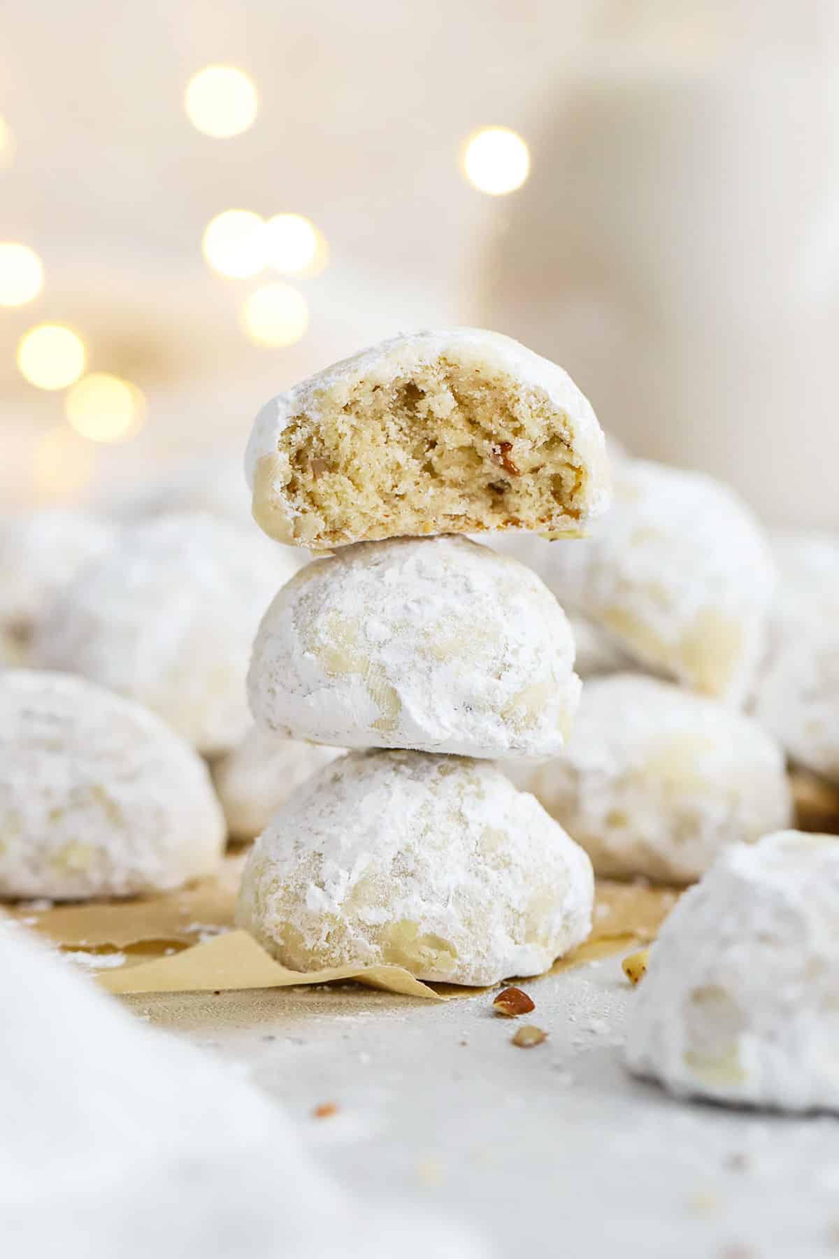 These gluten-free Mexican wedding cookies (aka gluten-free snowball cookies!) will absolutely melt in your mouth. With their delicate texture & delicious flavor, they're a perfect gluten-free holiday cookie recipe! Add them to a gluten-free holiday cookie plate or for a gluten-free cookie exchange. They're always a hit! 