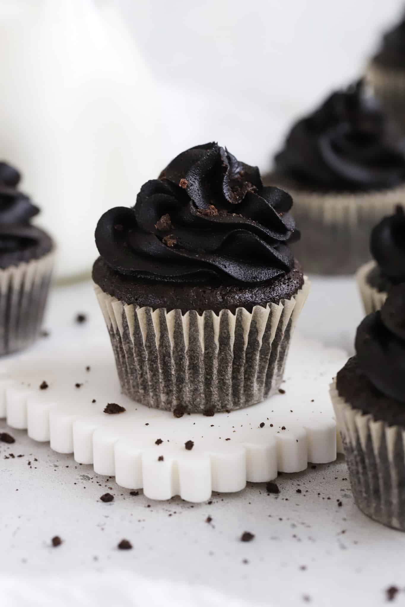 Gluten-free black velvet cupcakes topped with black cocoa buttercream